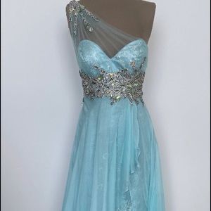 Blue A line evening gown with cape and jewels